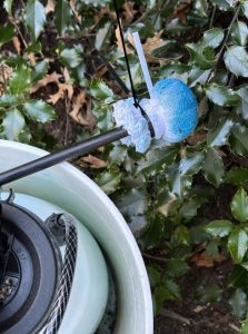 A cloth wrapped sponge